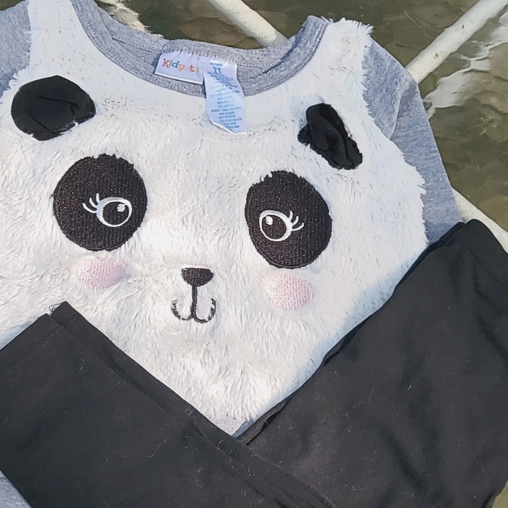 Kid gets 2T long sleeve outfit